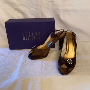 Satin platform shoe with 3 1/2” heel.